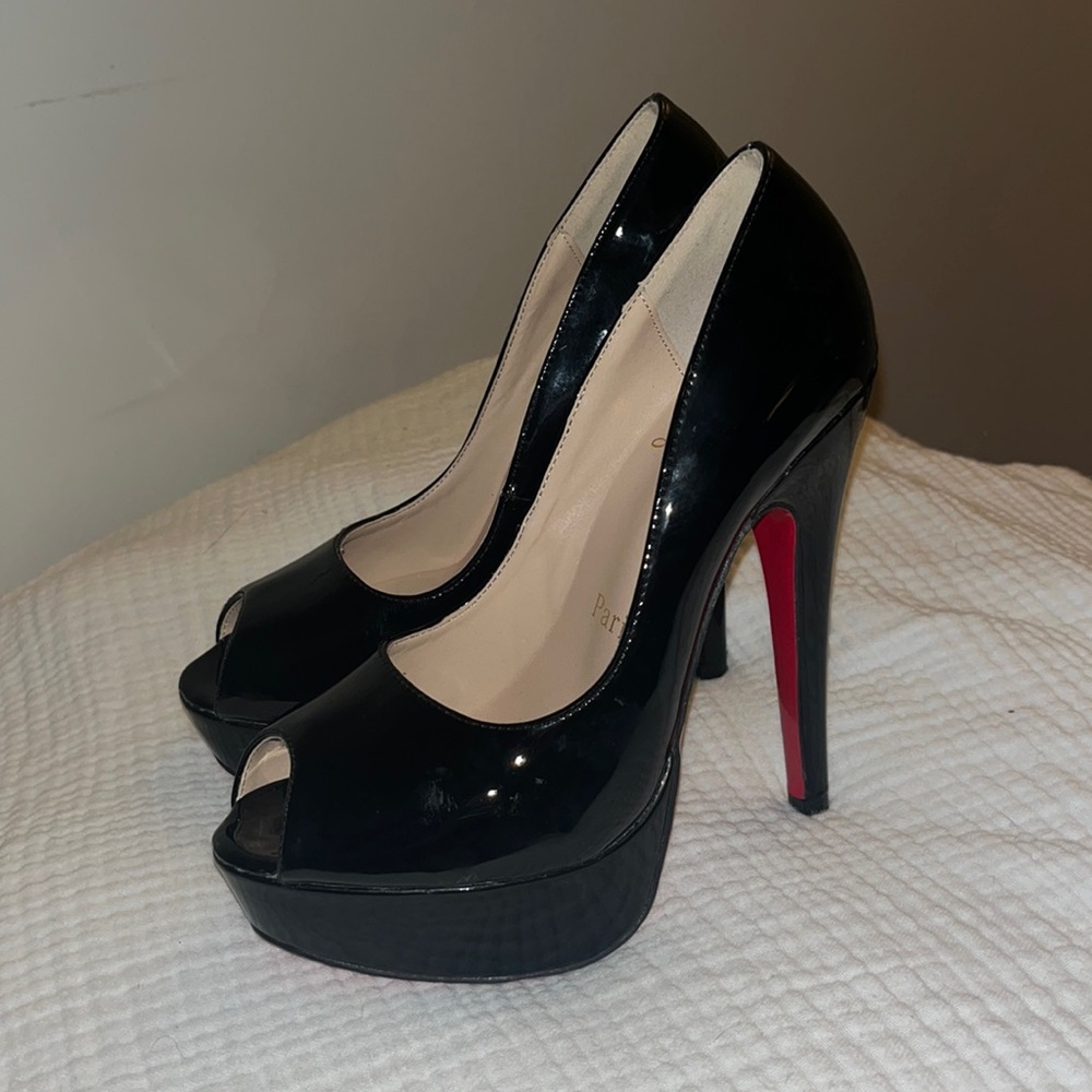 Louboutin patent peep toe pumps